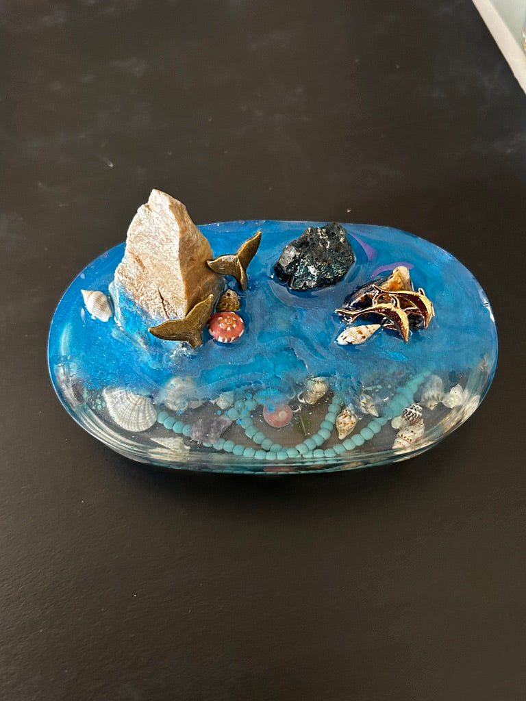 Whale Tail, Crystal & Dragon Oval Resin Paperweight – Miniature World 3x5x1 inch with gold whale tail and raw crystal in ocean blue resin