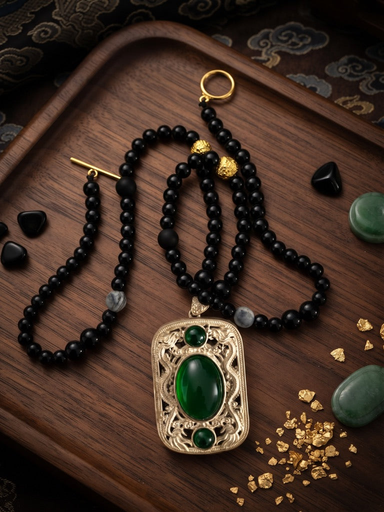Imperial Dragon 22 inch black onyx necklace with gold accents and silver dragon filigree jade pendant