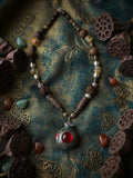 No. 45 – Crimson Talisman – handcrafted rudraksha and silver pendant necklace