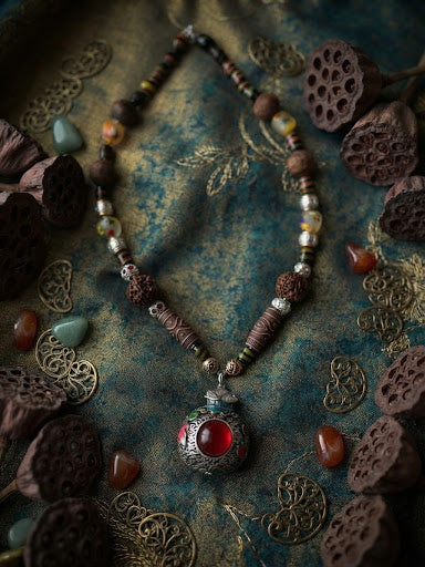 No. 45 – Crimson Talisman – handcrafted rudraksha and silver pendant necklace