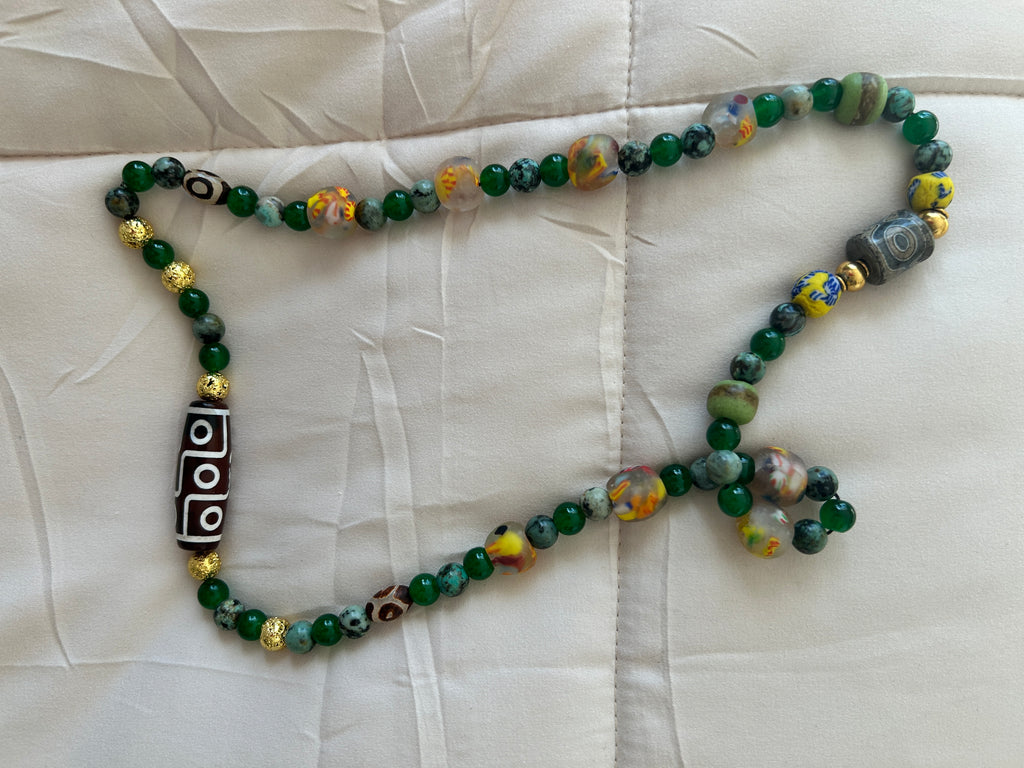 No. 47 Jade & Dzi Caravan necklace on Southwestern blanket