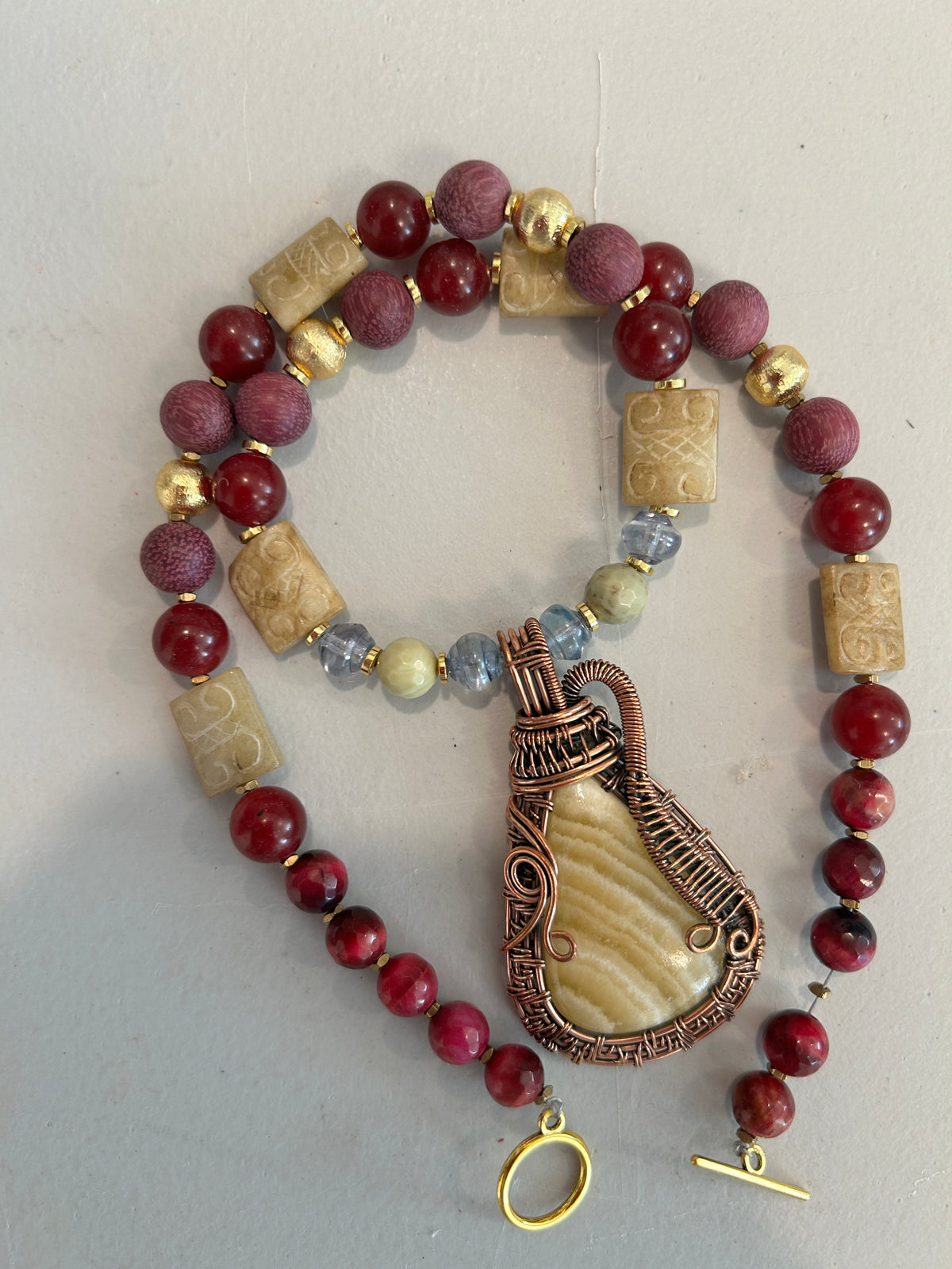 No. 49 Crimson Earth & Copper necklace sunlit detail