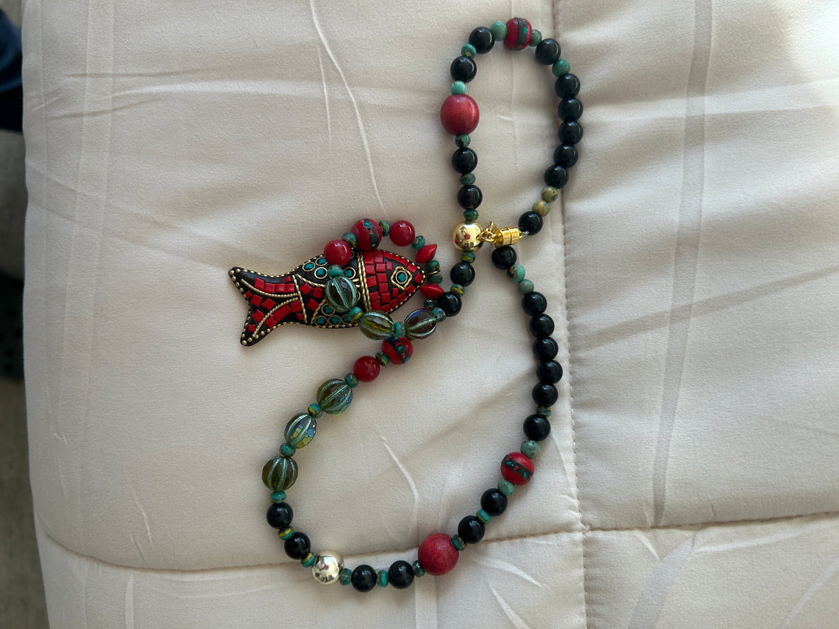 No. 57 Crimson Koi & Onyx necklace full view on wood