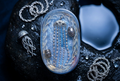 Silver Jellyfish Crystal Tentacle Oval Resin Paperweight in ethereal moonlit midnight ocean editorial scene